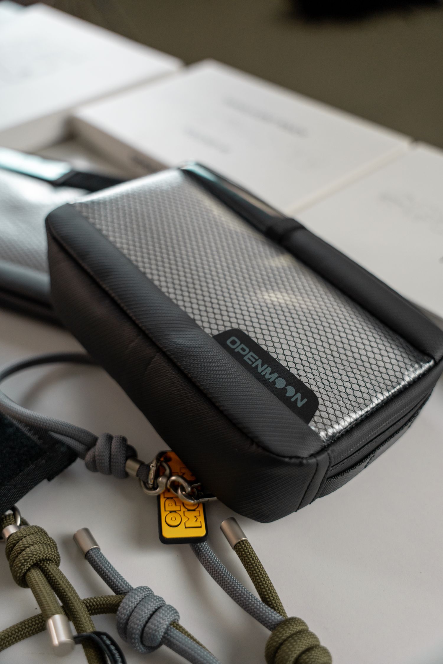 Sleek tech gadget with stylish case and accessories, perfect for tech enthusiasts.