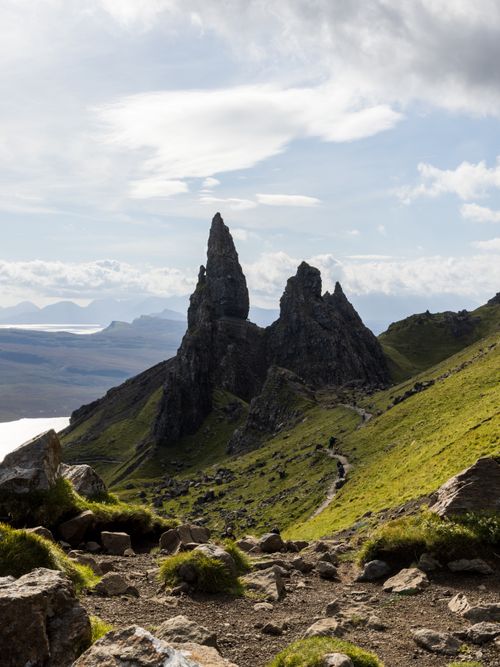 Free Majestic Old Man of Storr rock formation under a partly cloudy sky on the Isle of Skye, Scotland. Stock Photo