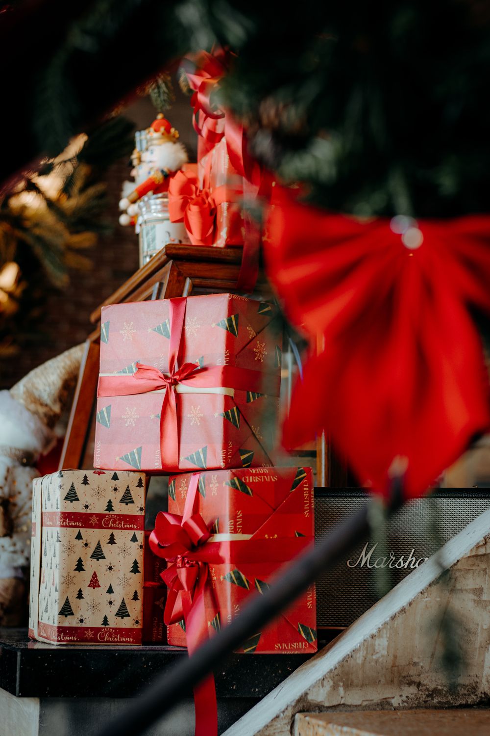 Wrapped Christmas gifts under a tree