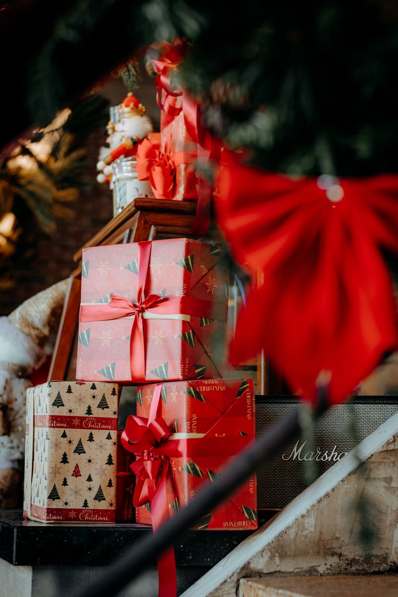 Wrapped Christmas gifts under a tree