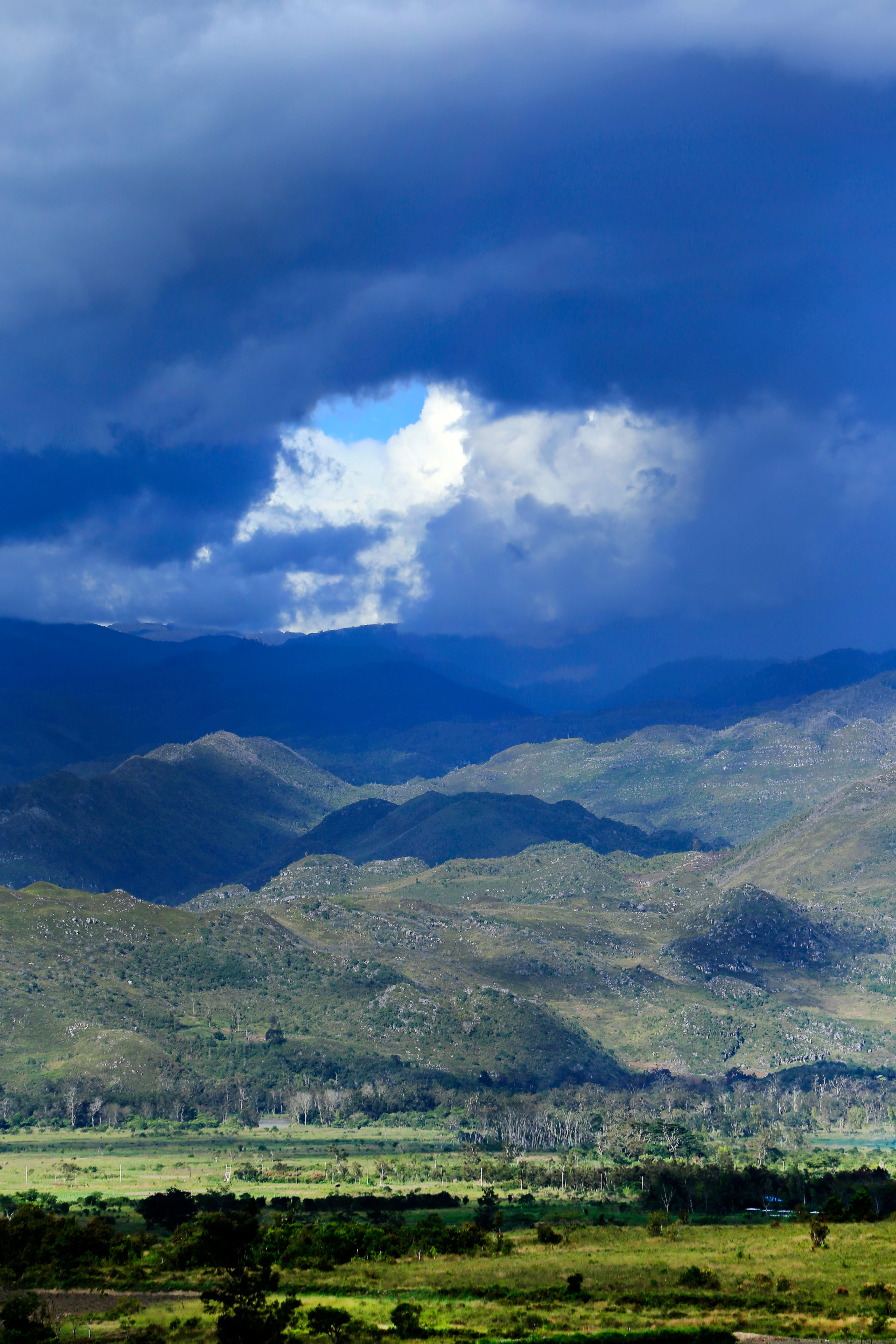 Dramatic Mountain Landscape with Stormy Sky · Free Stock Photo