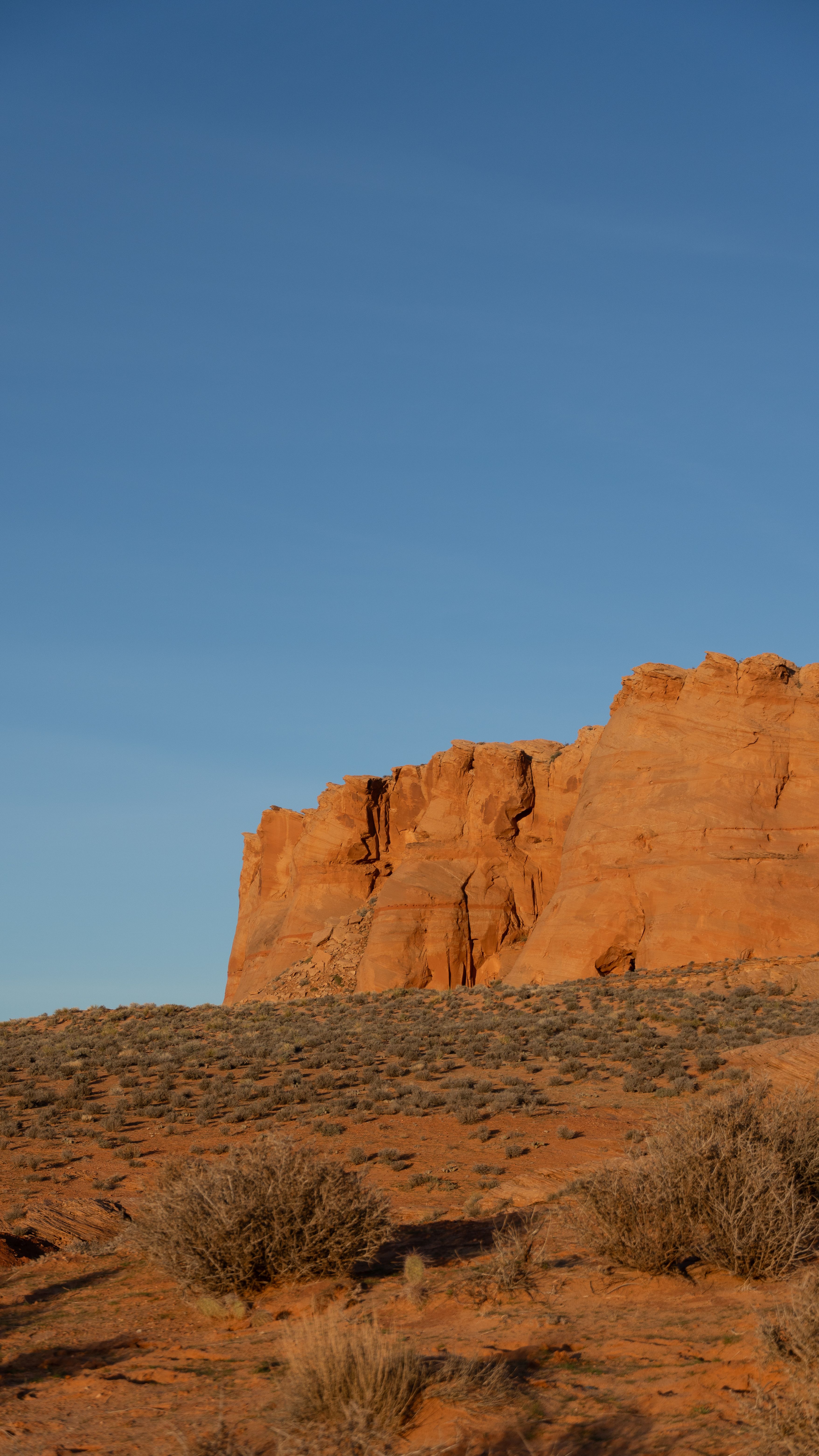 Majestic Red Rock Formation Against Clear Sky · Free Stock Photo