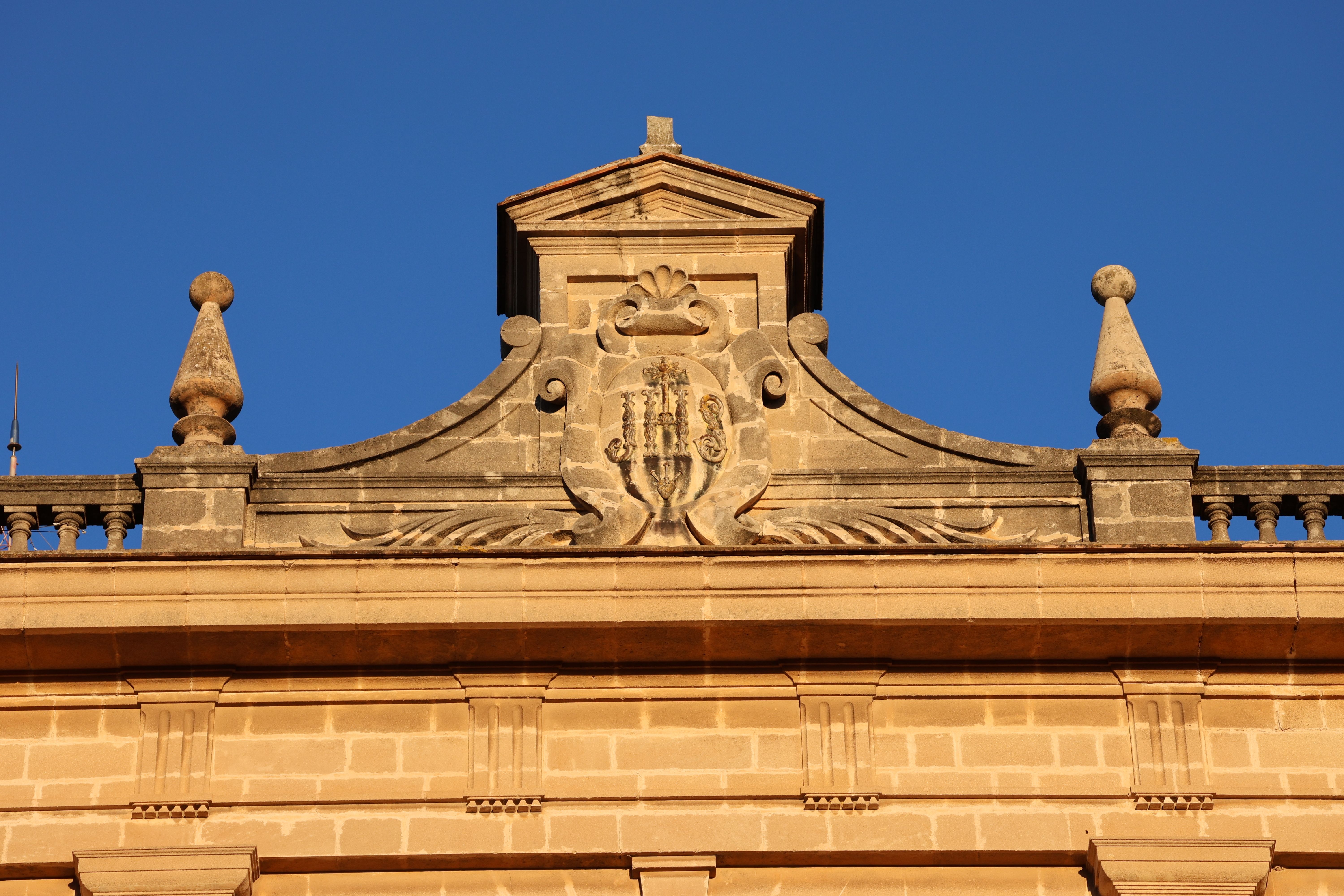 Ornate Historic Building Facade under Blue Sky · Free Stock Photo
