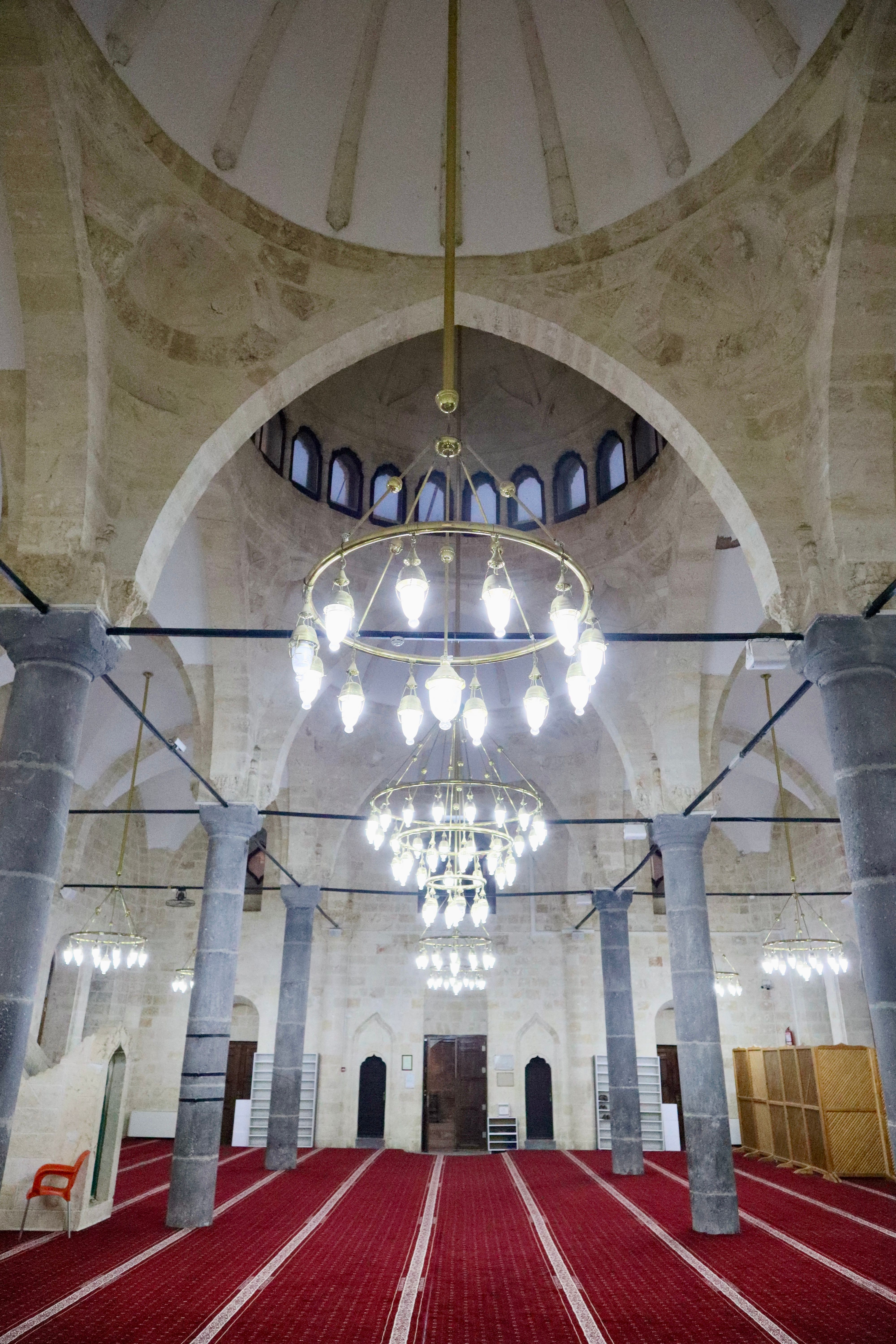 Free Explore the intricate architecture of a historic mosque interior in Şanlıurfa, Turkey. Perfect blend of art and history. Stock Photo