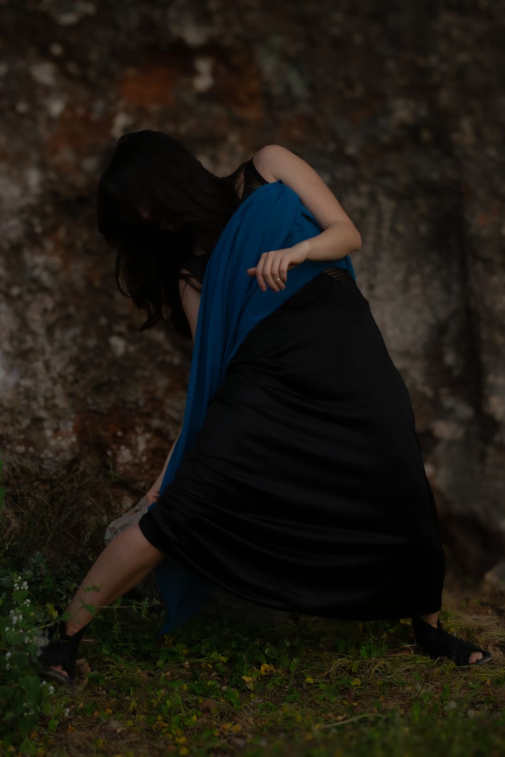 Dramatic Dance Pose Against Rustic Background · Free Stock Photo