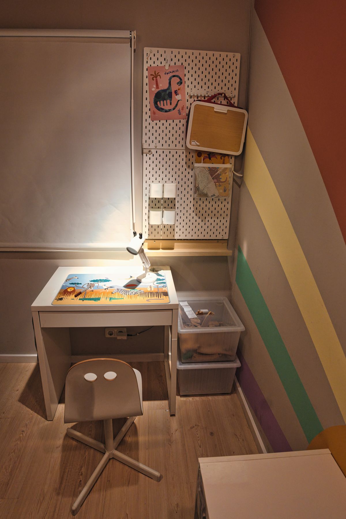 Children's study corner with desk and wall decor