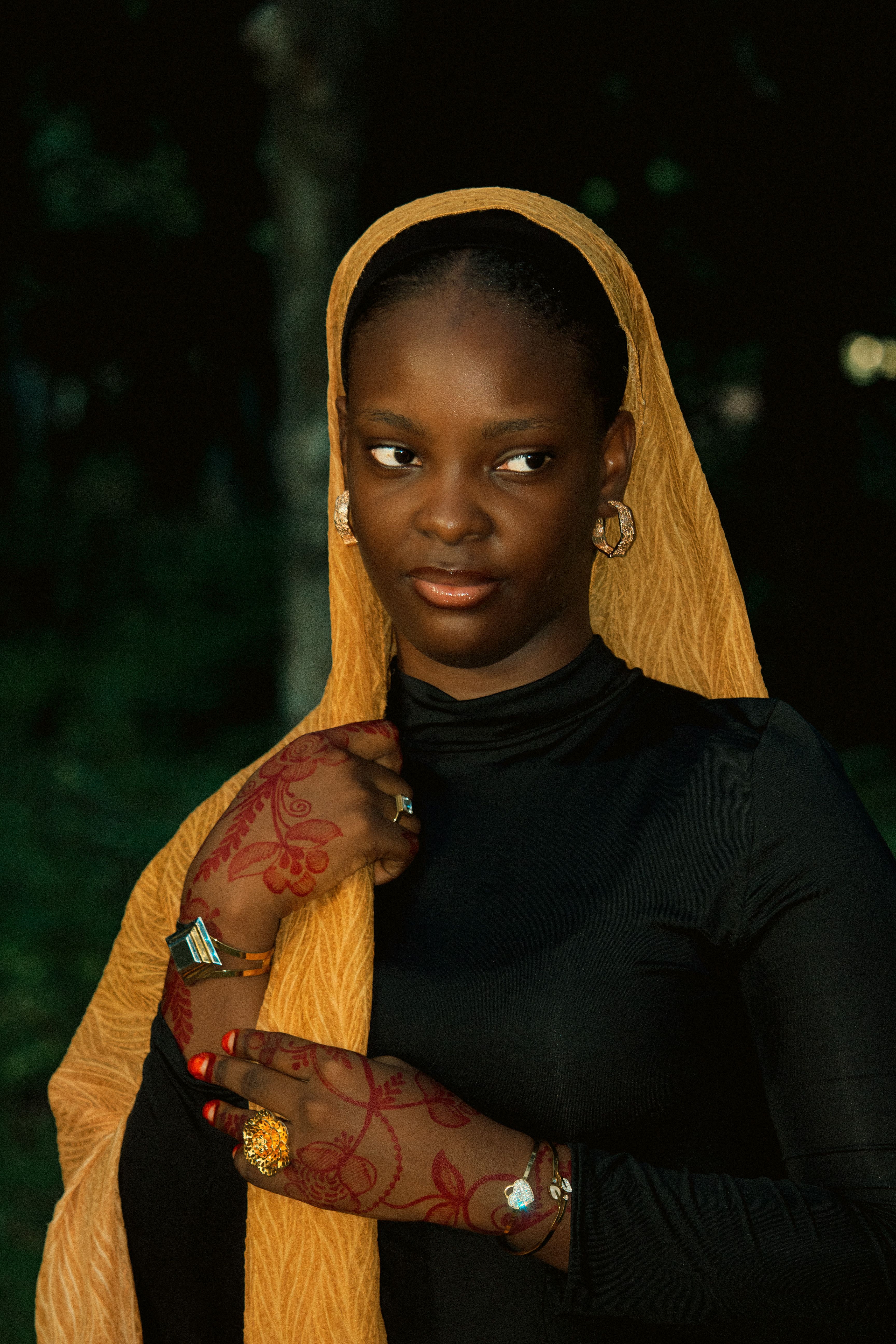 Portrait of Young Woman in Yellow Headscarf Outdoors · Free Stock Photo