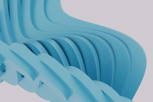 A sleek and smooth abstract design showcasing blue geometric forms in a 3D render.