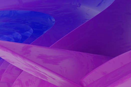 Dynamic abstract design featuring flowing waves in vibrant purple and blue hues.