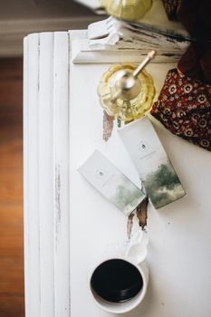 Chic flatlay featuring organic skincare products with coffee and warm tones.