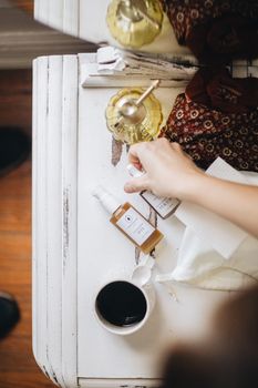 Flat lay of natural skincare products in a cozy setup, emphasizing self-care and beauty.