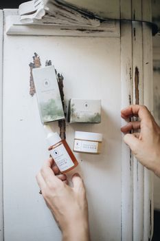 A cozy flatlay showcasing luxury artisan skincare with warm tones and natural textures.