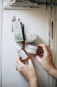 Minimalist flat lay of luxury skincare products with neutral tones.