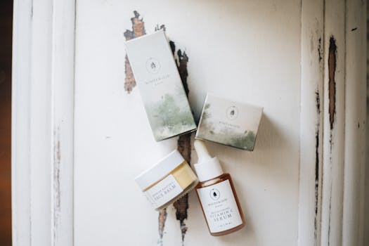 Flat lay of organic skincare items on a rustic surface, emphasizing natural beauty and minimalism.