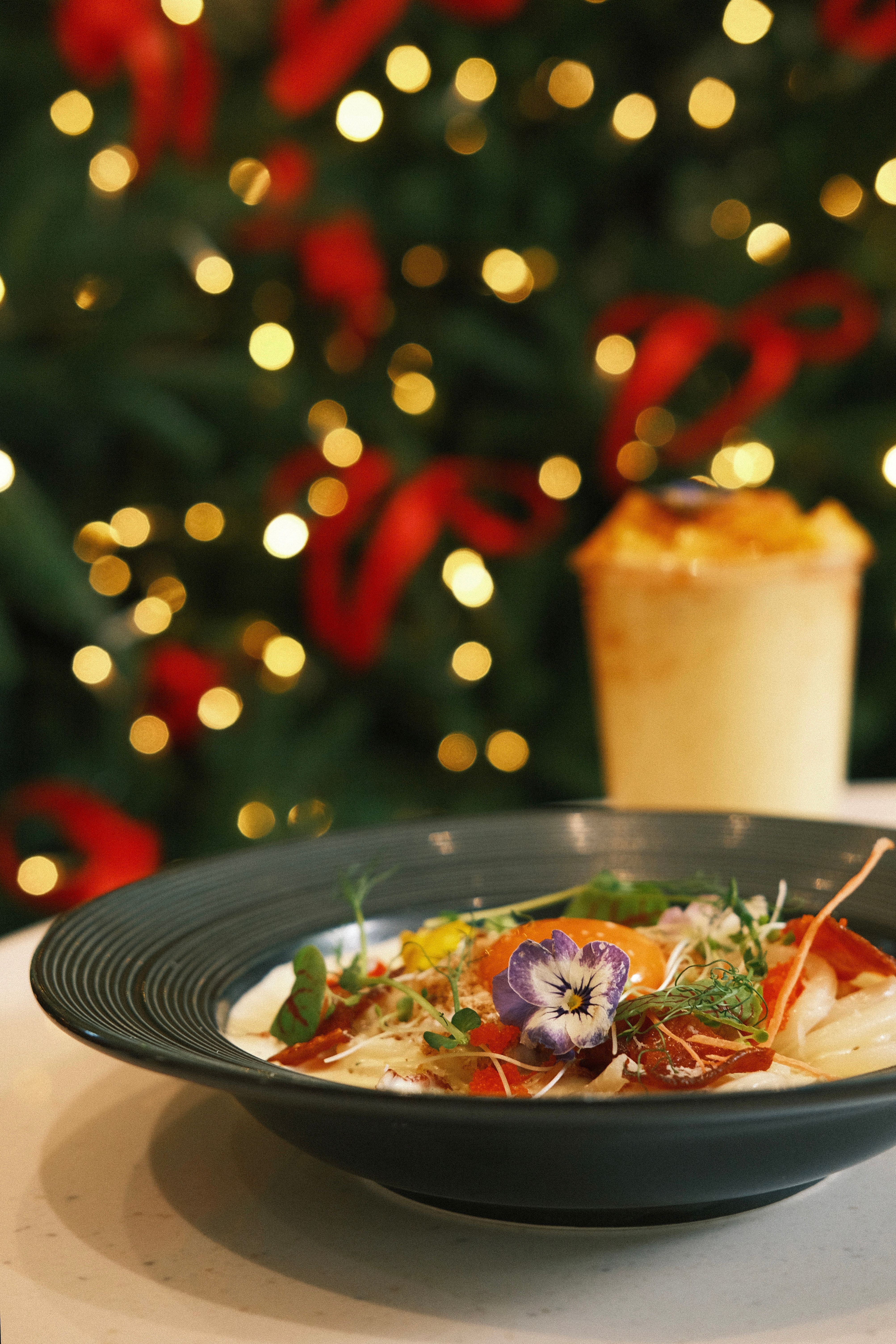Festive Holiday Meal with Pasta and Drink · Free Stock Photo