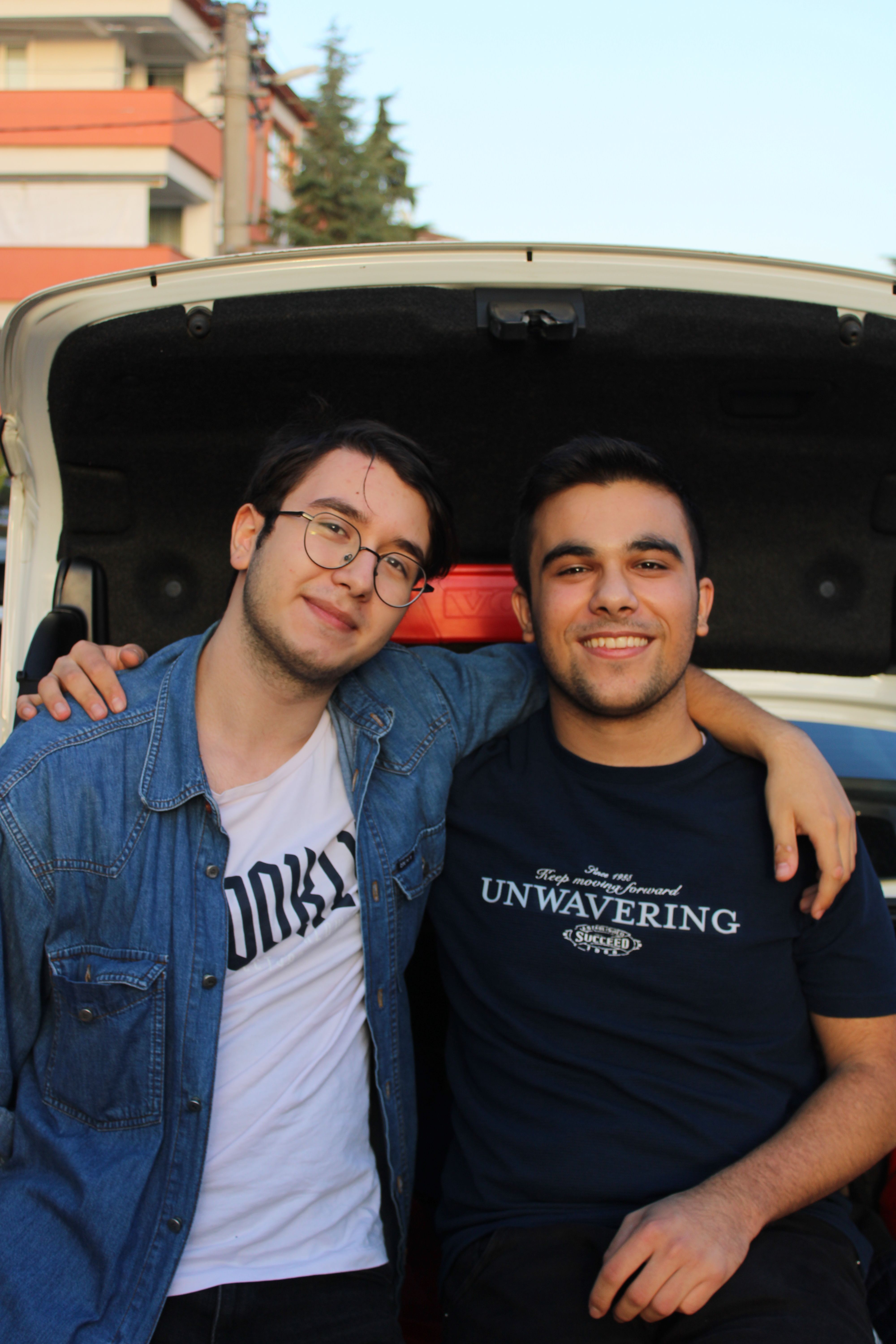 Students using mobile dating applications on university campus