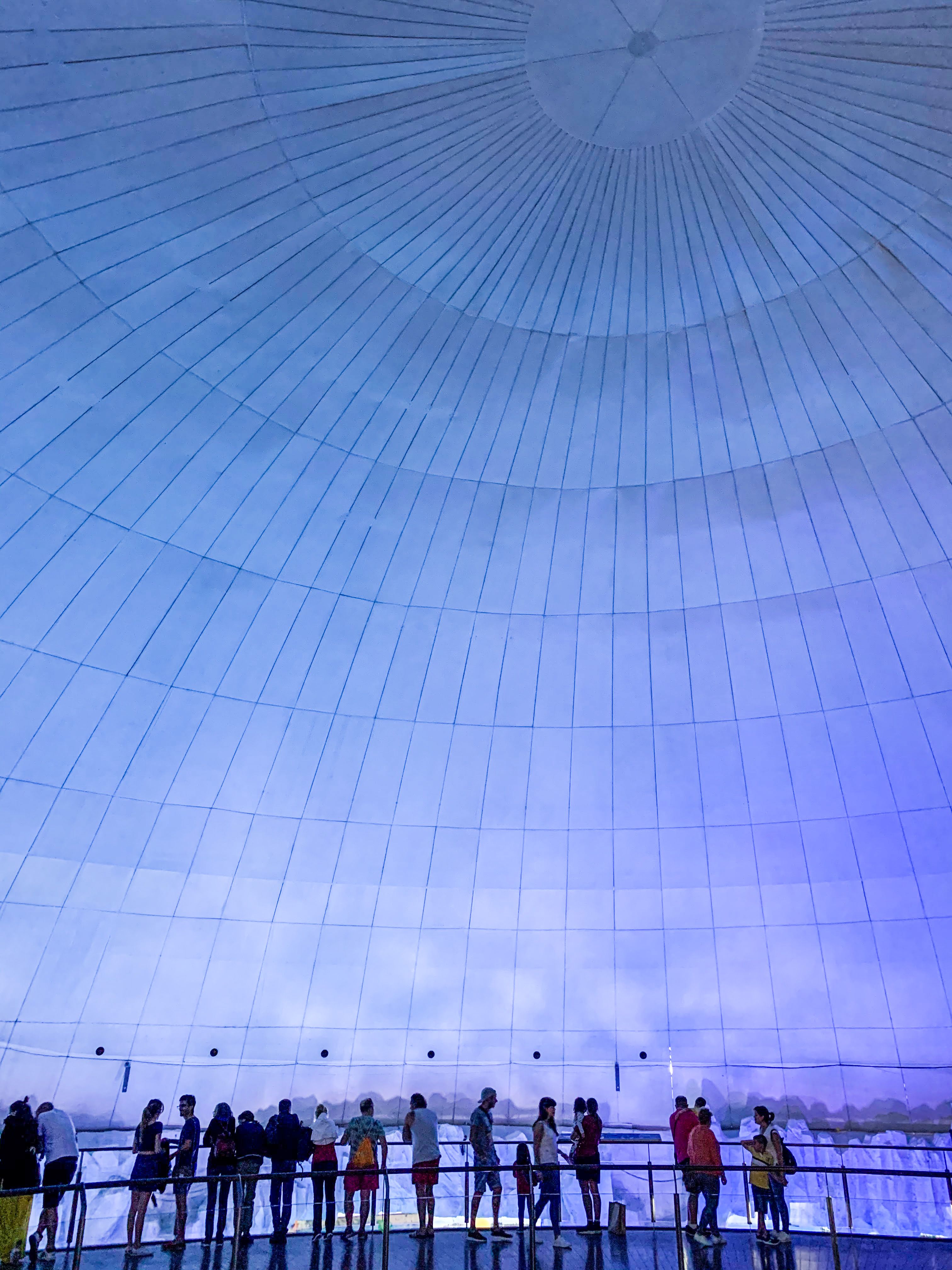 People Viewing Dome Interior with Blue Lighting · Free Stock Photo