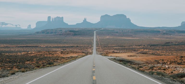 Moving during monsoon season in Phoenix on a desert road