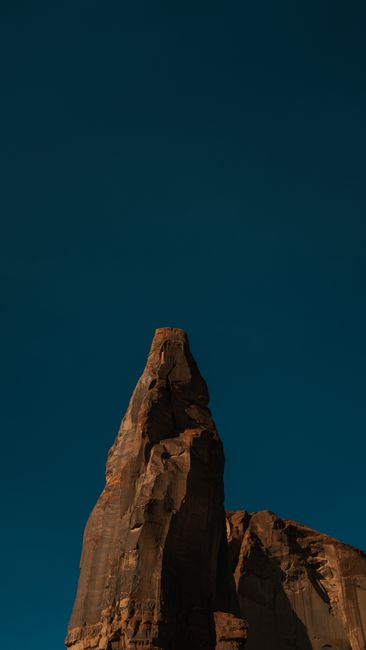 Stunning red rock formation in Arizona under a deep blue sky, ideal for nature lovers.