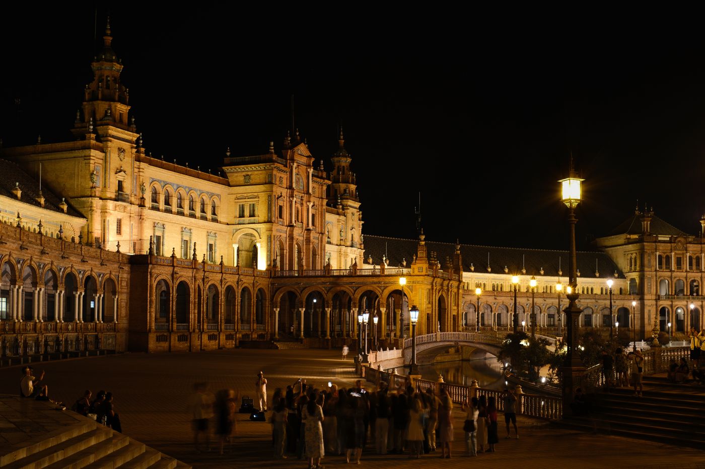 Seville's Plaza de España illuminated at night