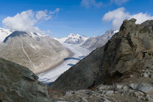 Free Stunning view of Aletsch Glacier amidst rugged Swiss Alps under a clear blue sky. Stock Photo
