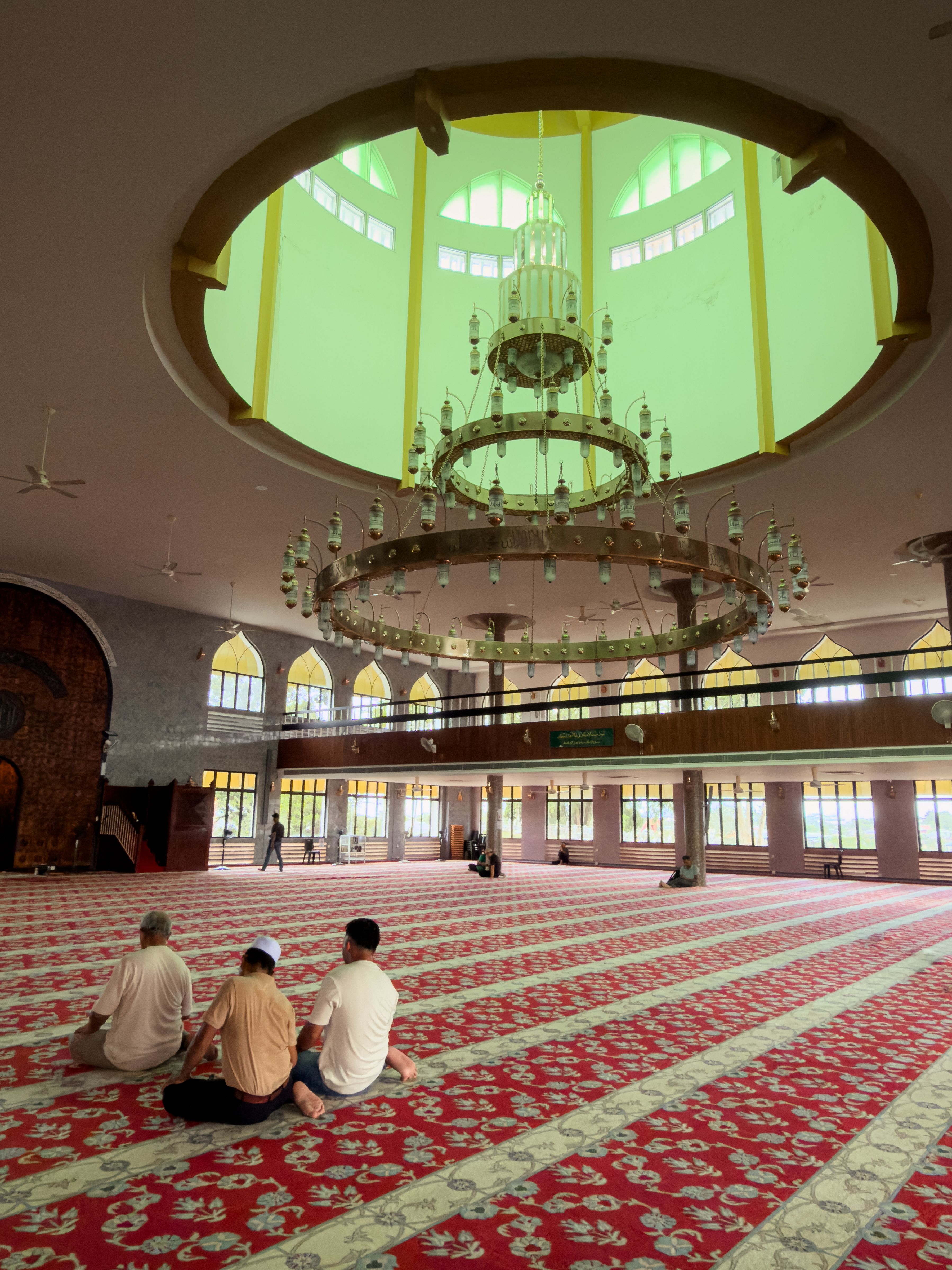 Peaceful Reflection in a Grand Mosque Interior · Free Stock Photo
