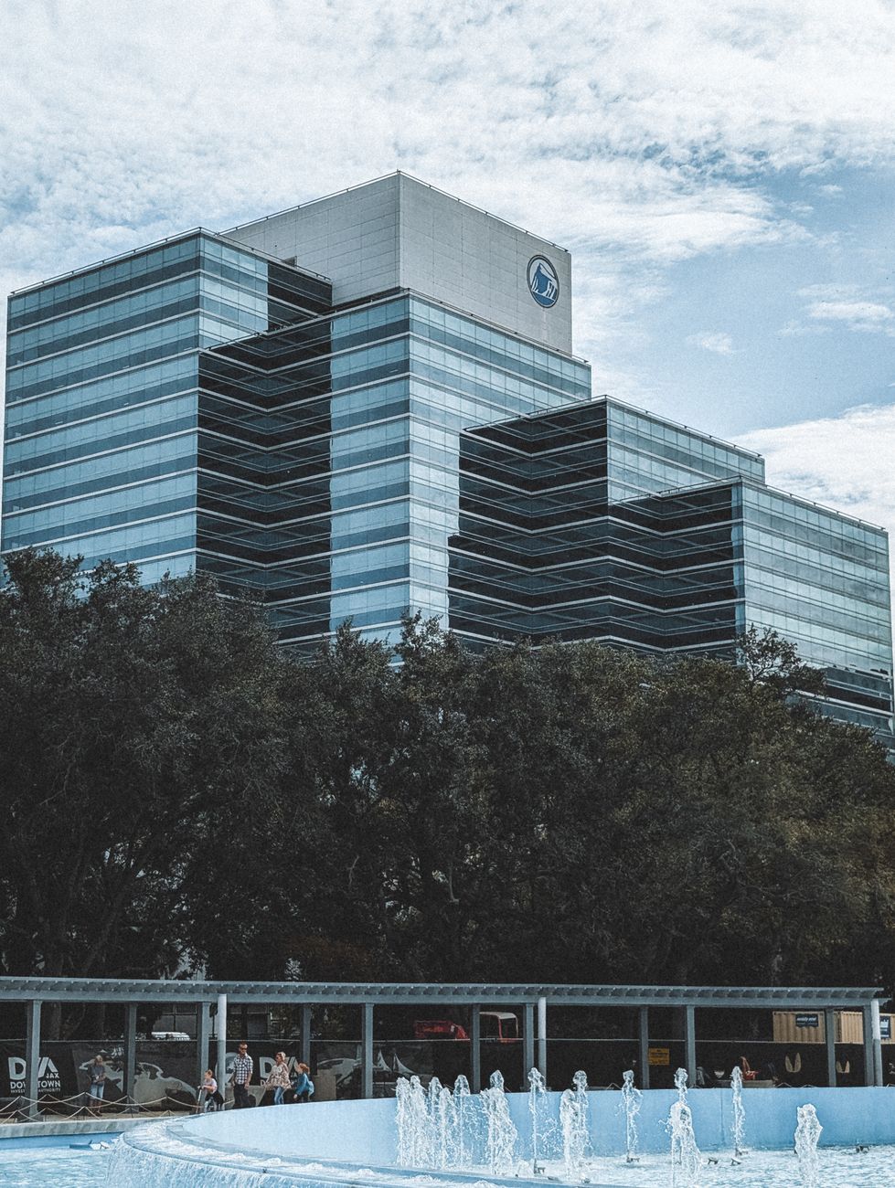 View of a modern office building behind a fountain in Jacksonville, Florida.