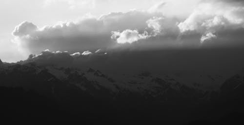 açık, bulutlu, dağlar içeren Ücretsiz stok fotoğraf