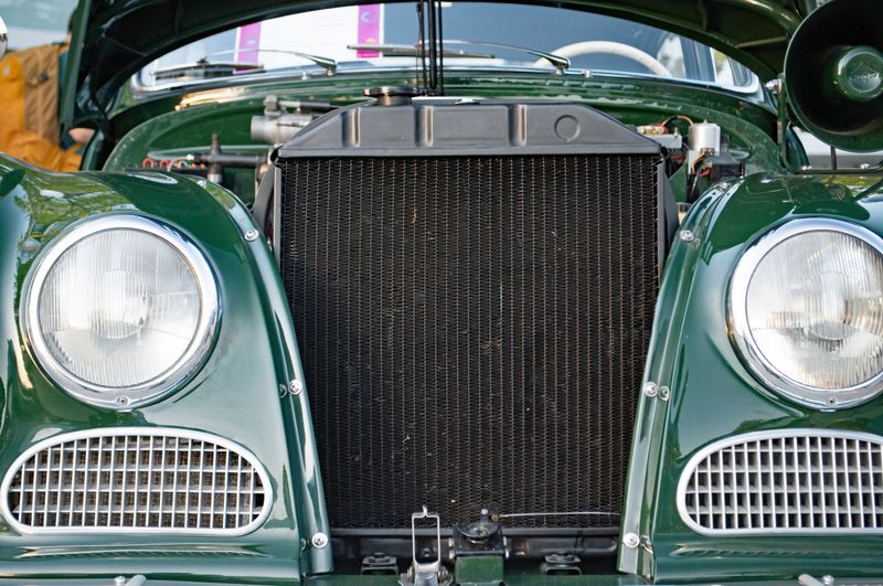 Vintage green car radiator close-up