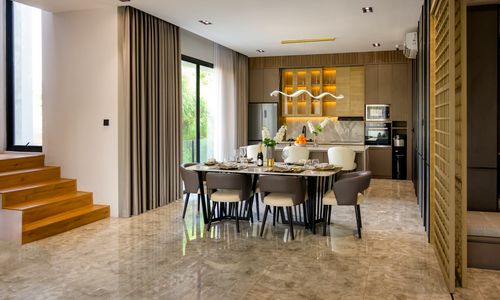 Free A stylish and modern dining area in a home in Jakarta, Indonesia. Stock Photo