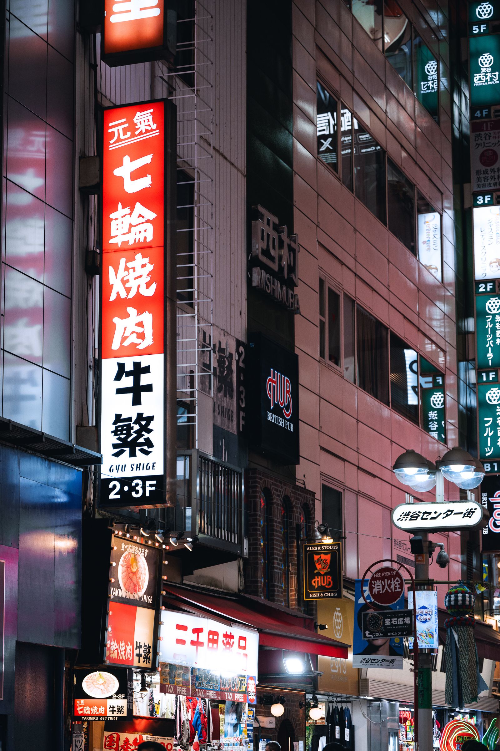Vibrant Tokyo Street with Neon Signs at Night · Free Stock Photo