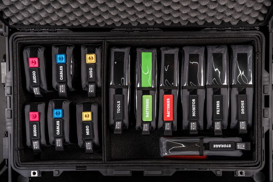 Neatly packed camera gear and accessories in a hard protective case.