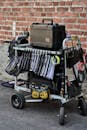 Film Set Equipment Cart Against Brick Wall