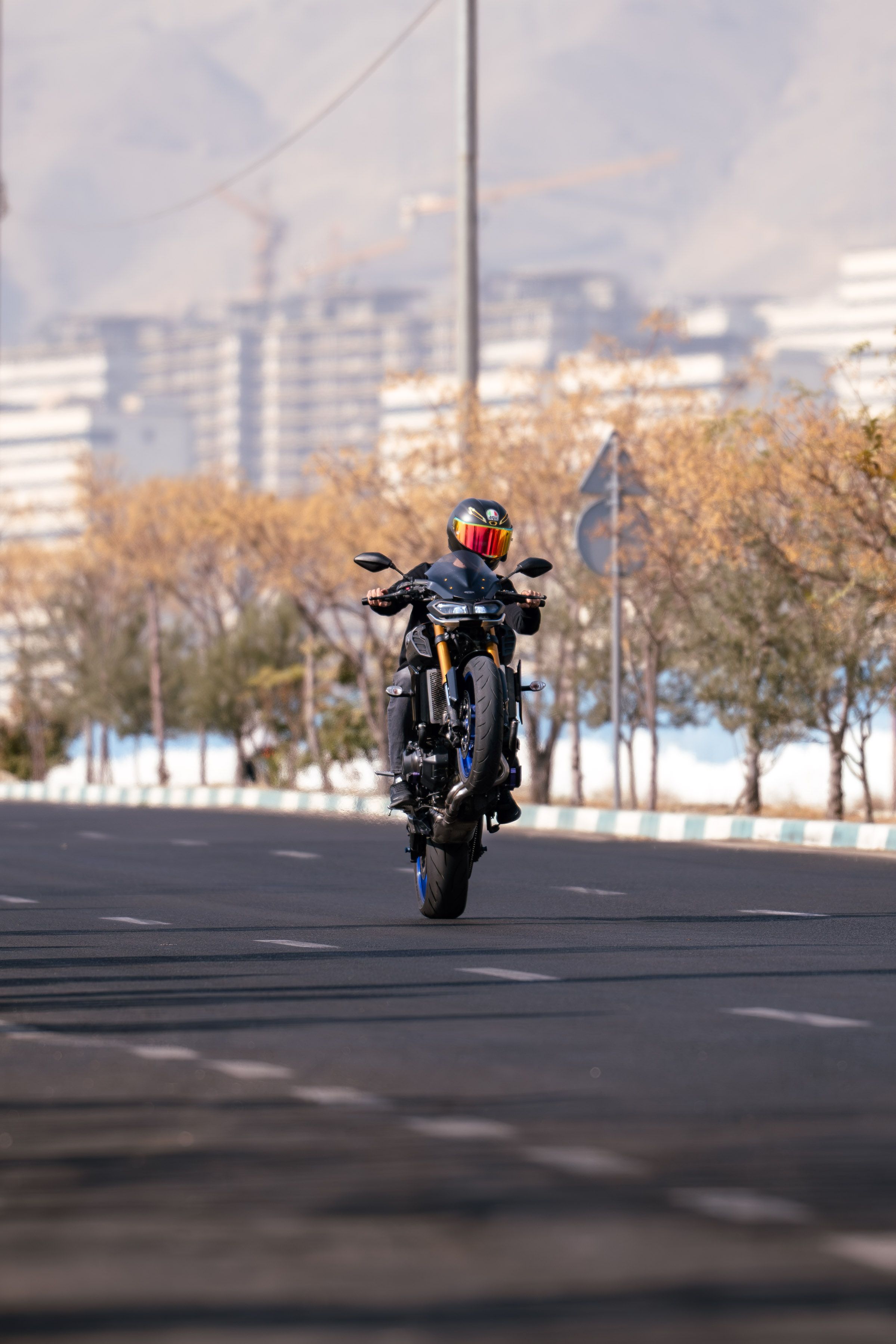 Motorbike Stunt on Tehran Street · Free Stock Photo