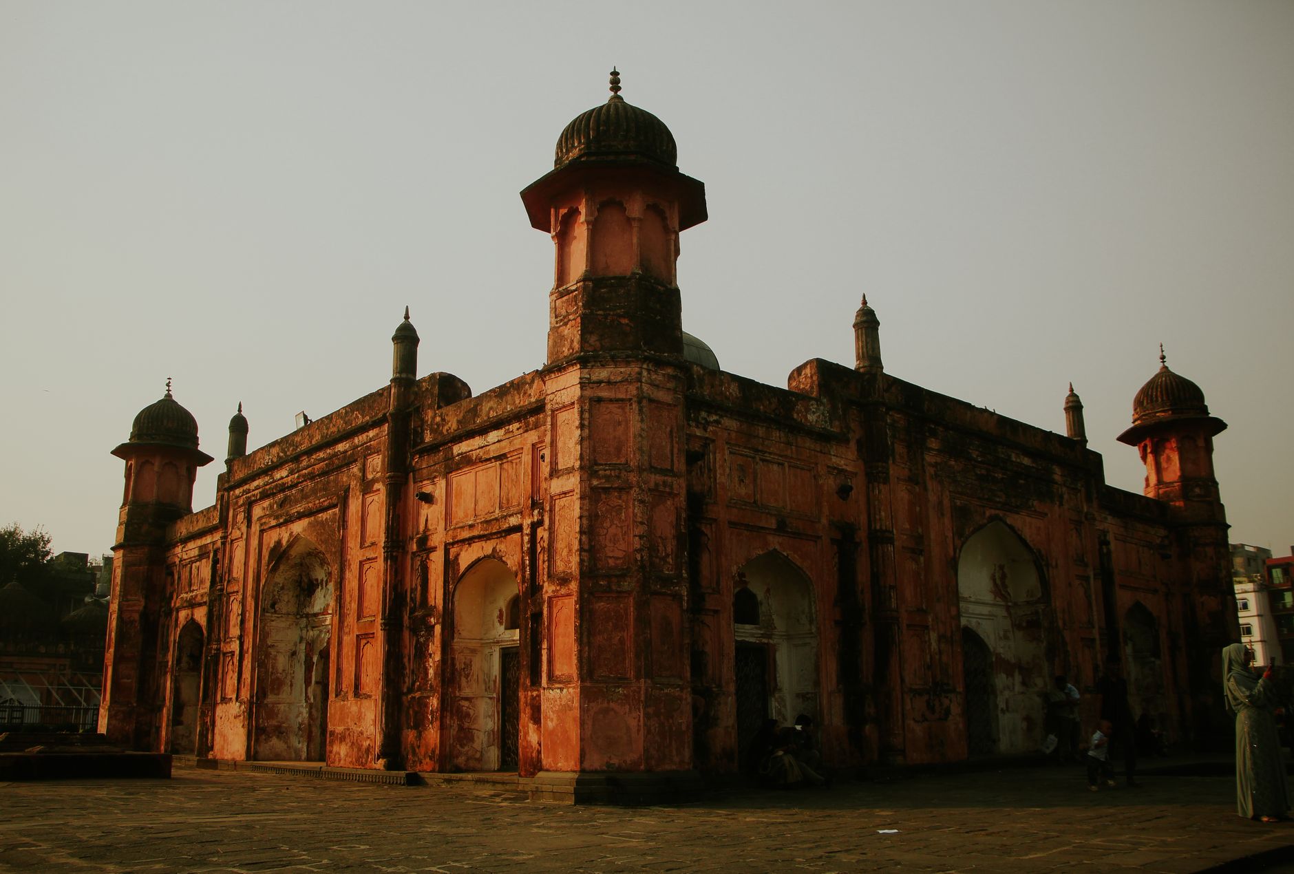 Explore the historical Lalbagh Fort in Dhaka, showcasing Mughal architectural beauty at sunset.