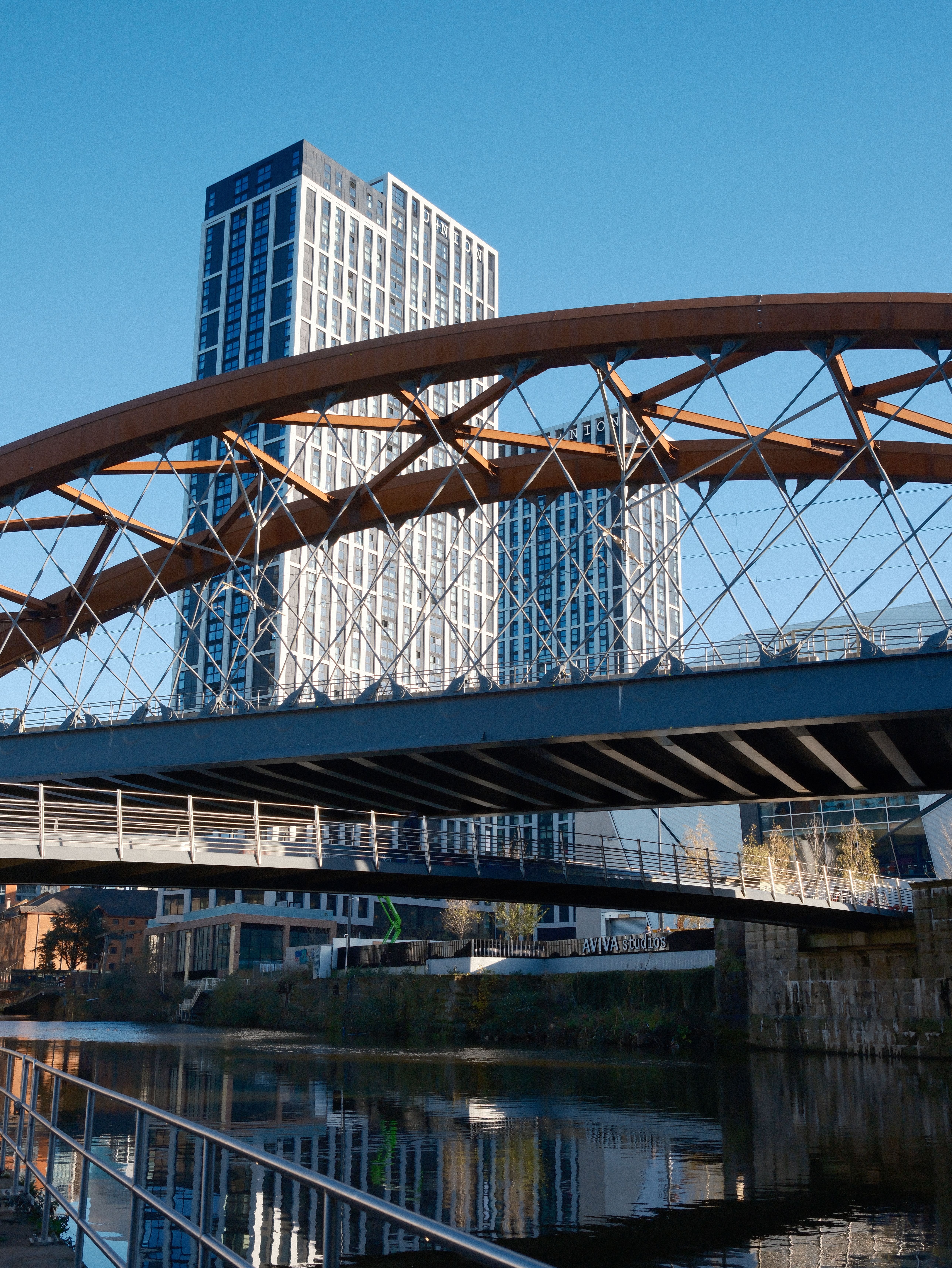 Modern Architecture and Bridge Over River · Free Stock Photo