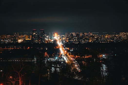 Stunning nighttime city view of Kyiv, Ukraine showcasing urban lights and vibrant streets.