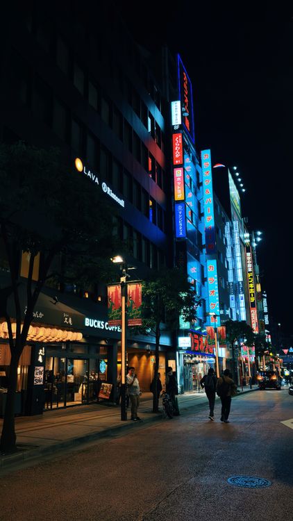 Vibrant Tokyo Night Street with Neon Signs · Free Stock Photo