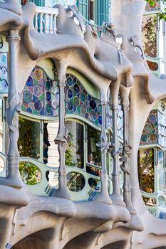 Close-up of Casa Batlló's ornate facade designed by Gaudí in Barcelona.