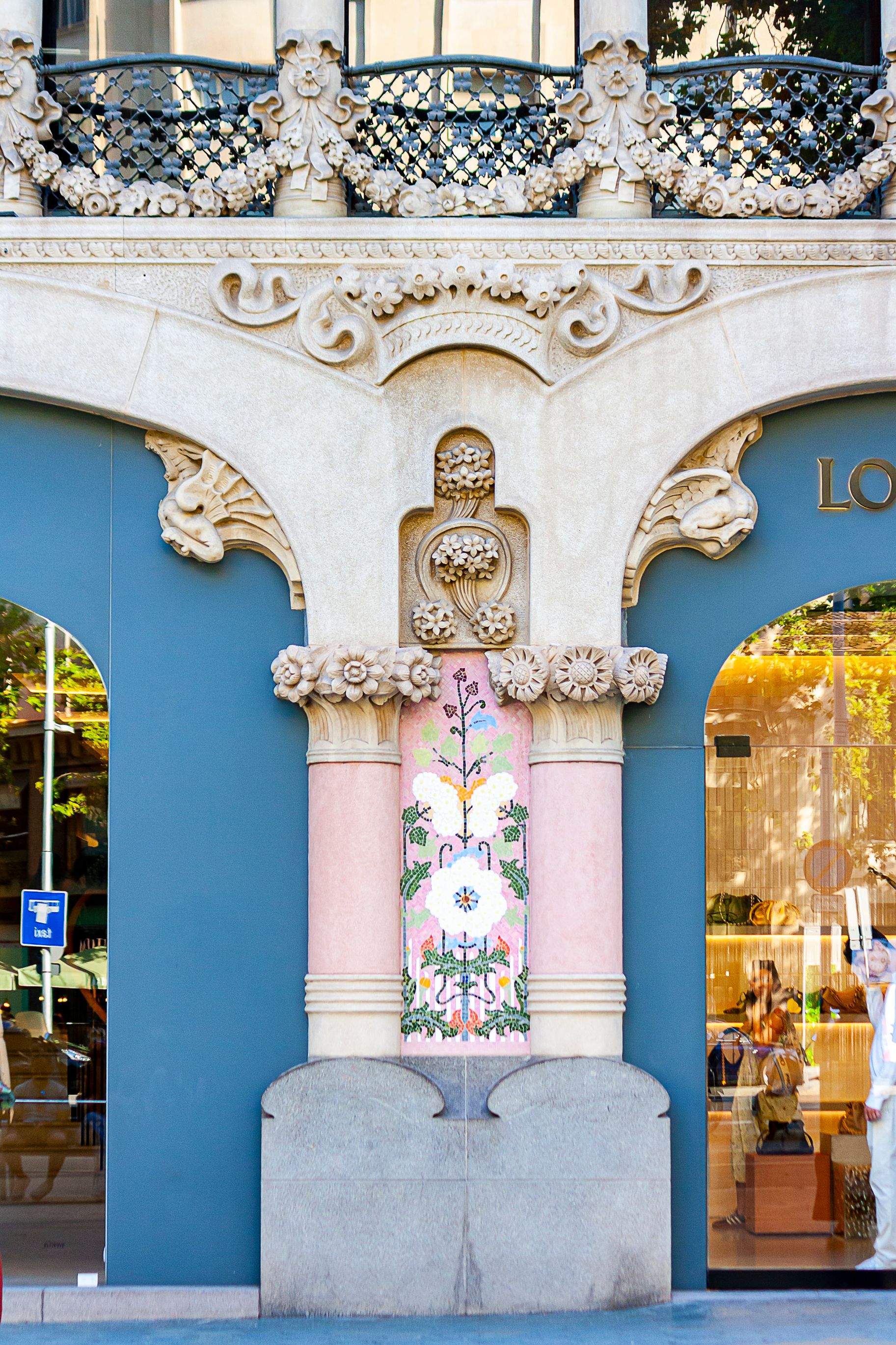Elegant Art Nouveau facade detail captured in Barcelona, showcasing intricate design.. elegant, nouveau, facade