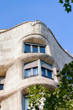 Detailed view of Casa Milà's unique architecture in Barcelona, showcasing its organic forms and textures.