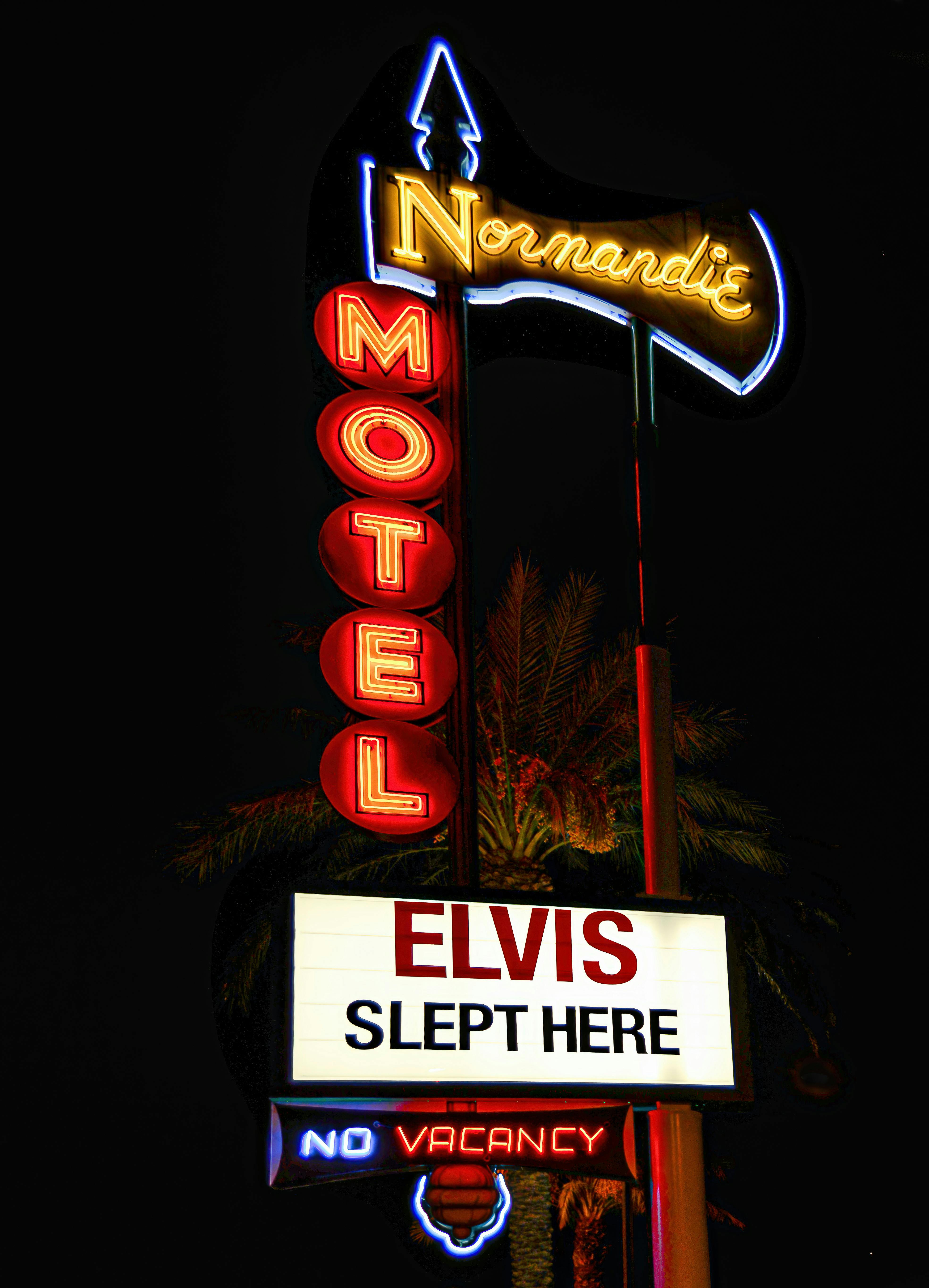 Vintage Neon Normandie Motel sign in Las Vegas with Elvis reference.