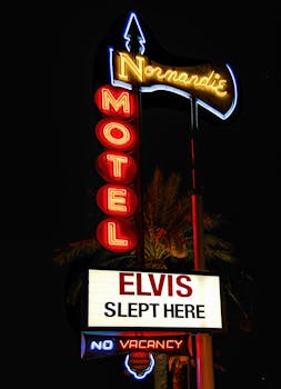 Vintage Neon Normandie Motel sign in Las Vegas with Elvis reference.