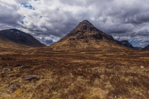 Free Stunning view of Buachaille Etive Mòr mountain landscape in Scotland with cloudy skies above. Stock Photo