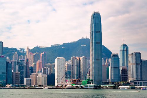Free Stunning view of Hong Kong skyline featuring the ICC Tower and harbor on a clear day. Stock Photo