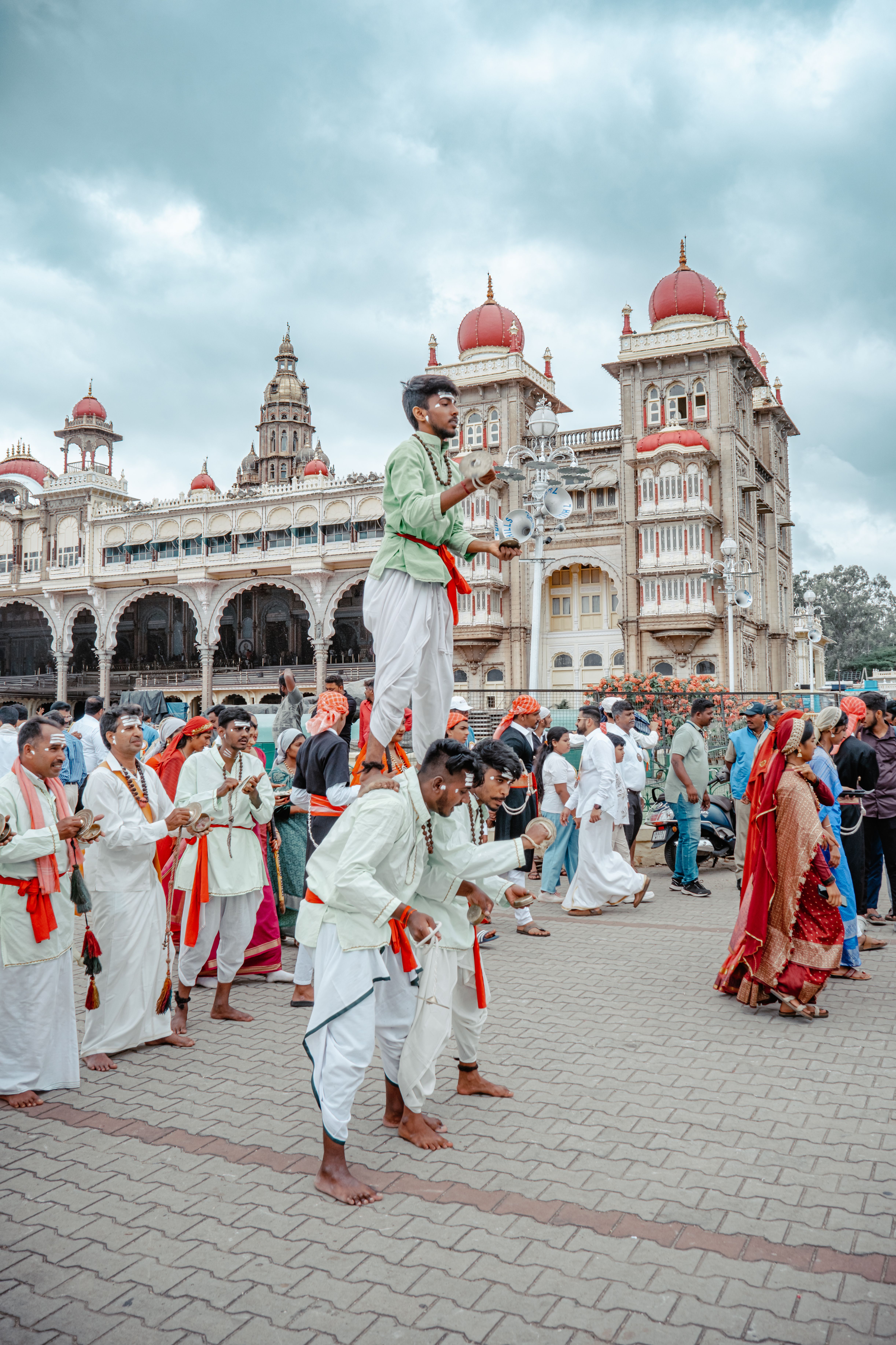 Vibrant cultural performance at Mysore Palace during a festival in Karnataka, India.