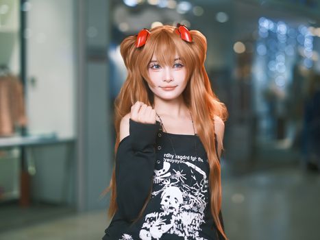 A vibrant portrait of a young adult in anime cosplay in an indoor setting.
