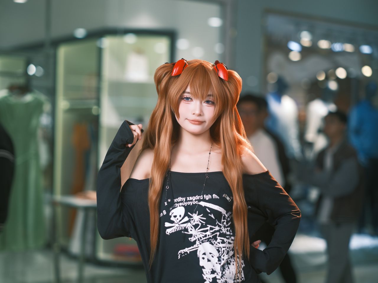 cosplayer posing indoors with vibrant costume at a convention center