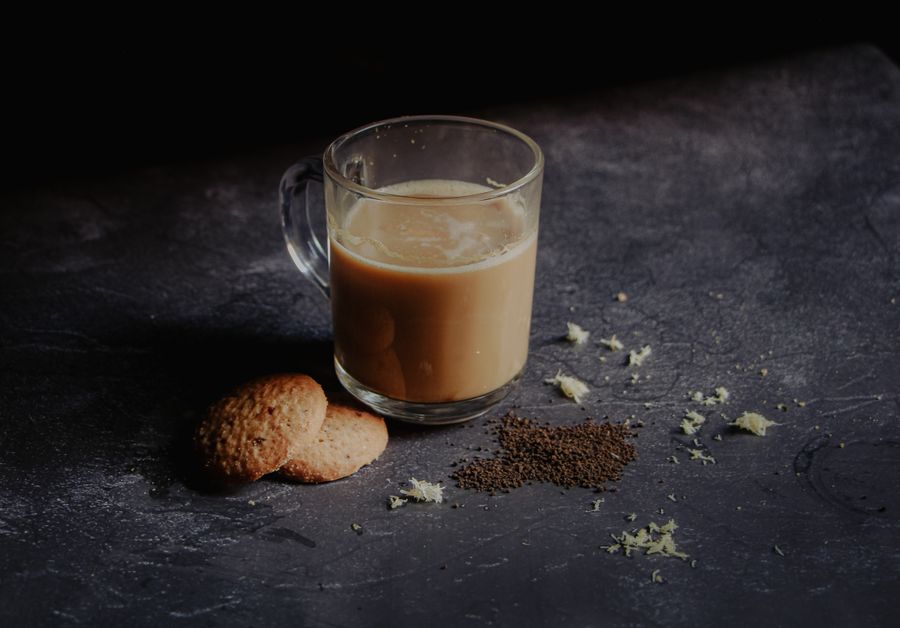 Warm cup of spiced chai on a dark background — Tanha Tamanna Syed on Pexels