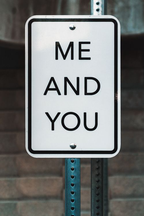 Free A street sign displaying 'Me and You' in an urban environment, Salt Lake City. Stock Photo